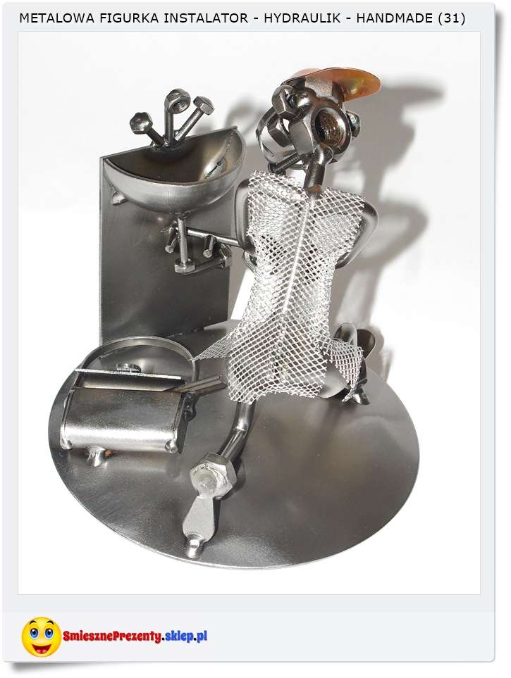 Hydraulik naprawia umywalkę